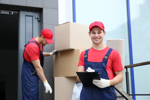 Boxes and household items being unloaded at a Footscray property
