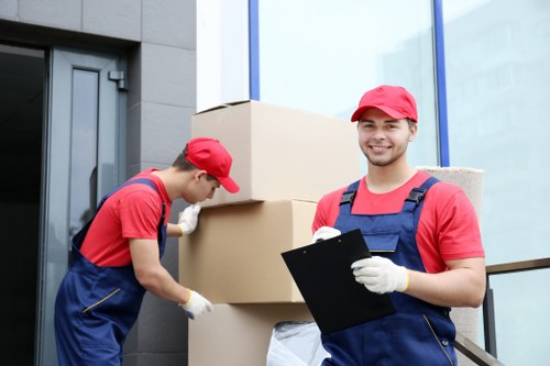 Packed boxes and furniture prepared for a home move in Footscray
