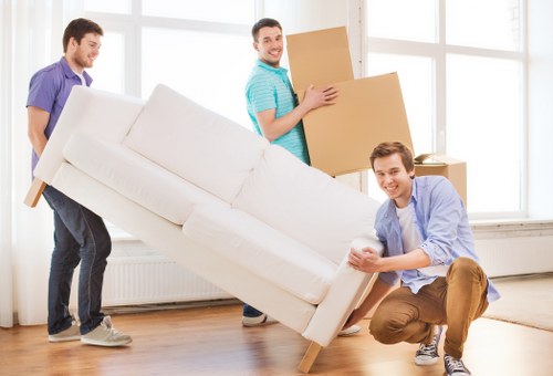 Careful packing and furniture handling on moving day in Footscray