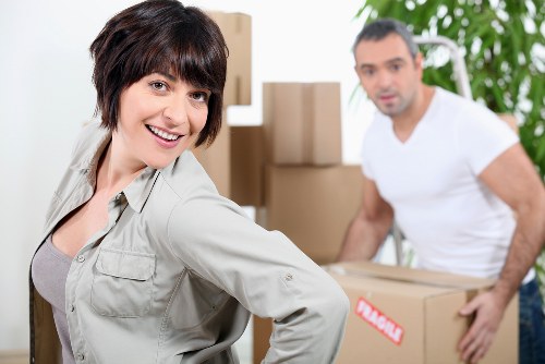 Boxes and furniture loaded into a removal van for transport