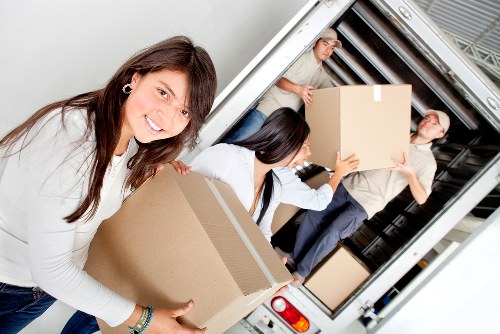 Professional team handling furniture pick-up in a Footscray street setting