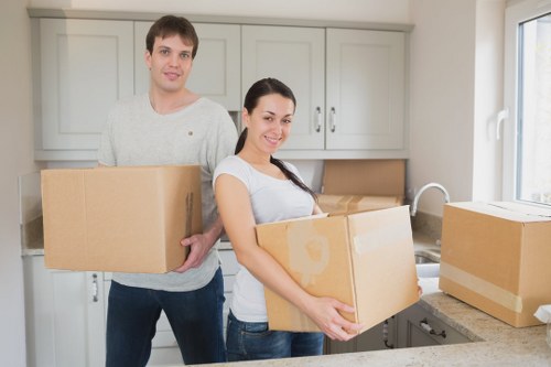 Careful wrapping and labelling of fragile household items before a move